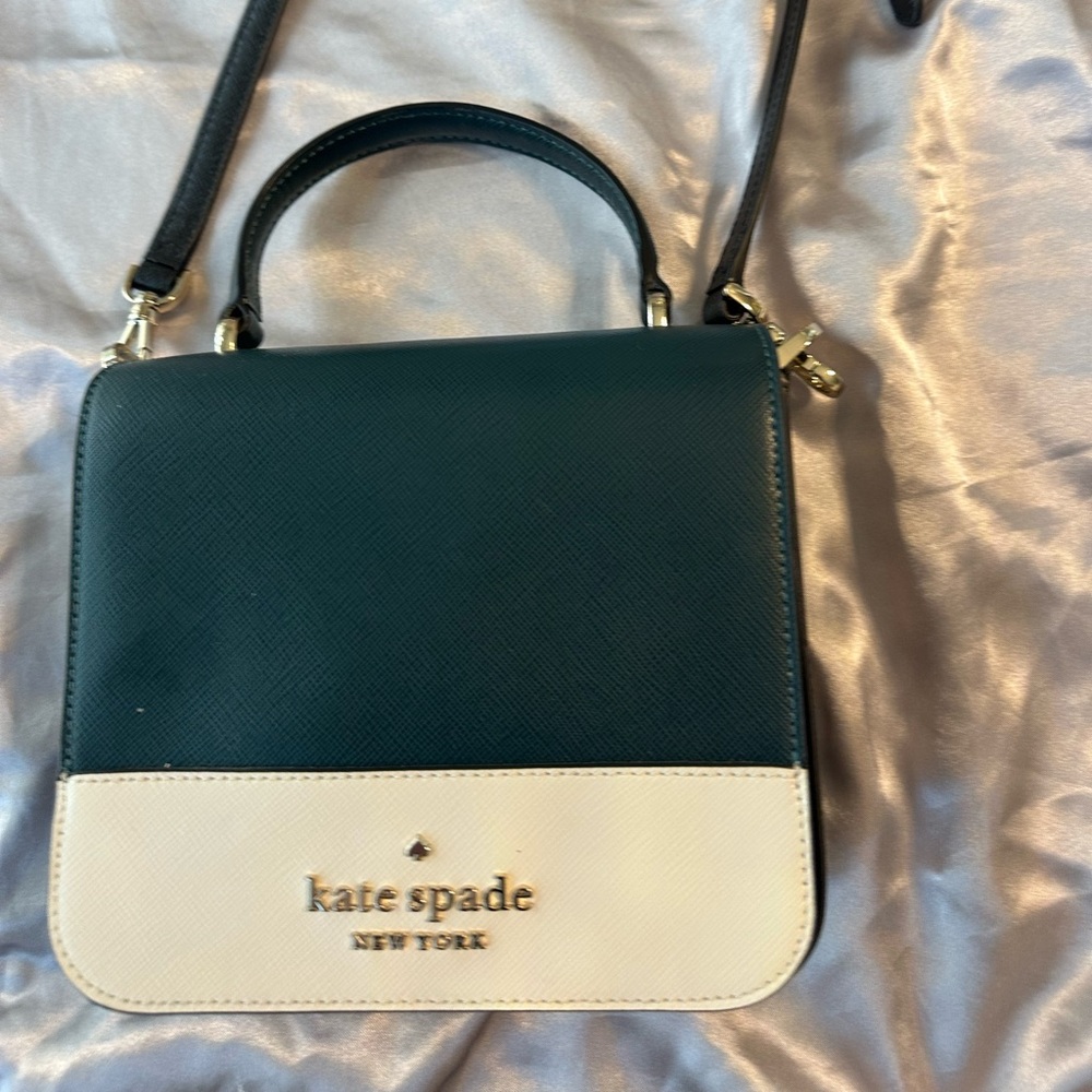Elegant Kate Spade Dark Green and Cream women’s purse.